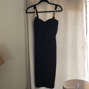 Black long formal dress with metal accents